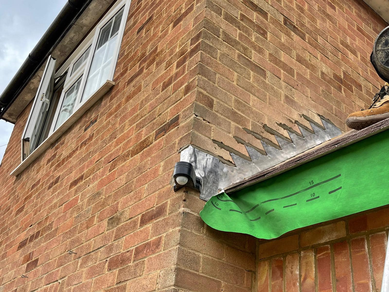 Professional roofers working on a property in London - KS Roof Master