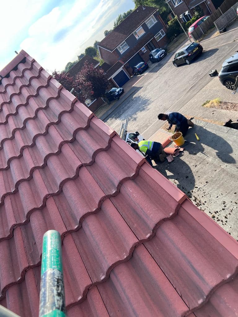 Professional roofers working on a property in London - KS Roof Master