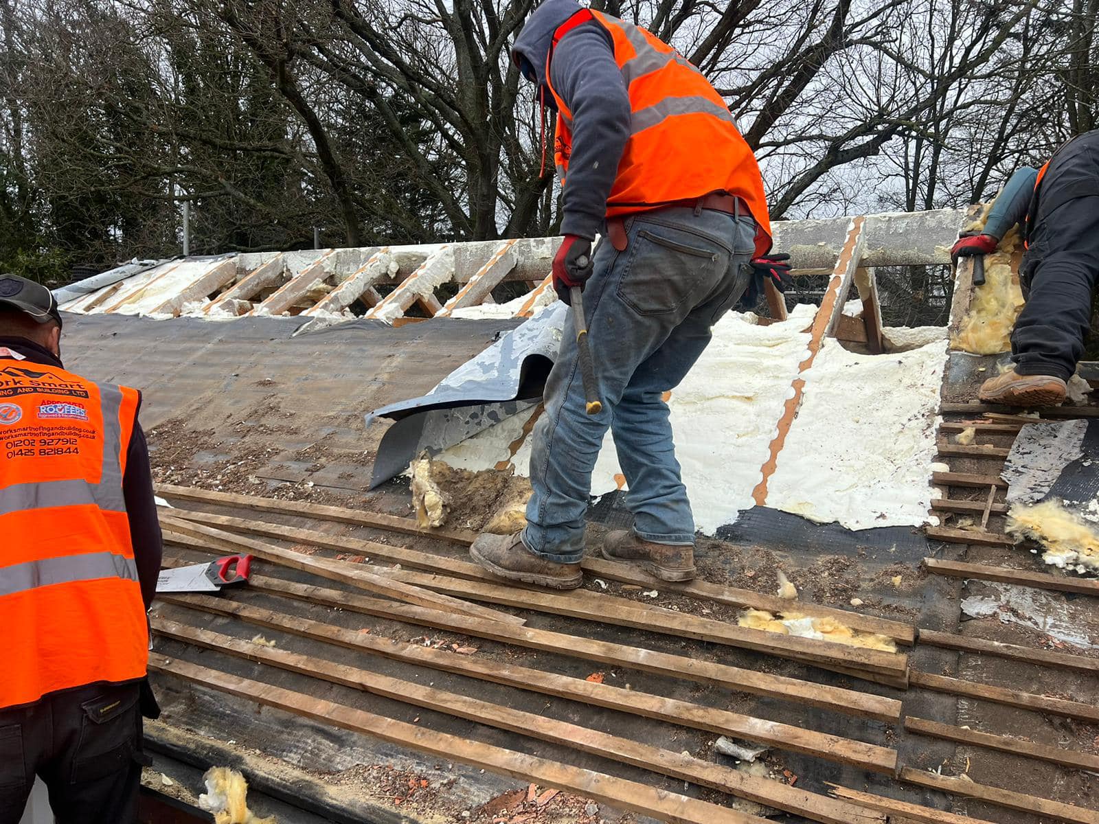 Professional roofers working on a property in London - KS Roof Master