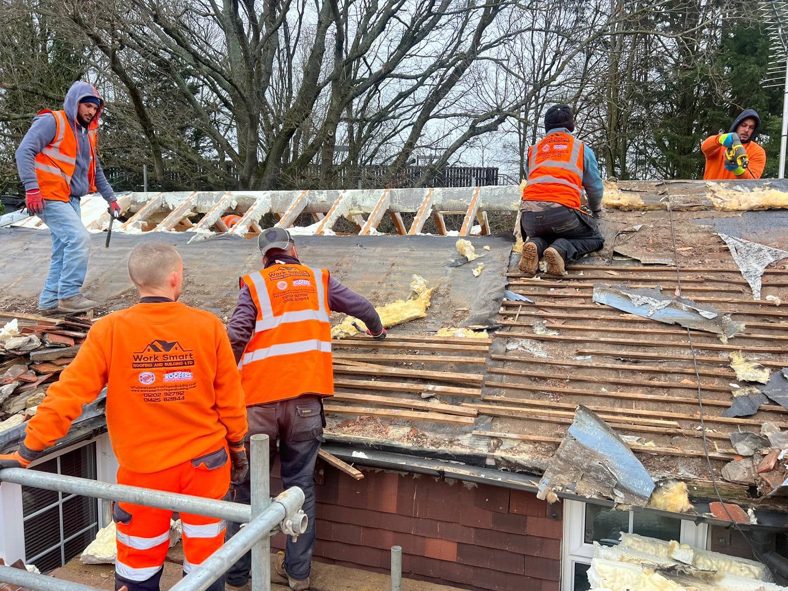 Professional roofers working on a property in London - KS Roof Master