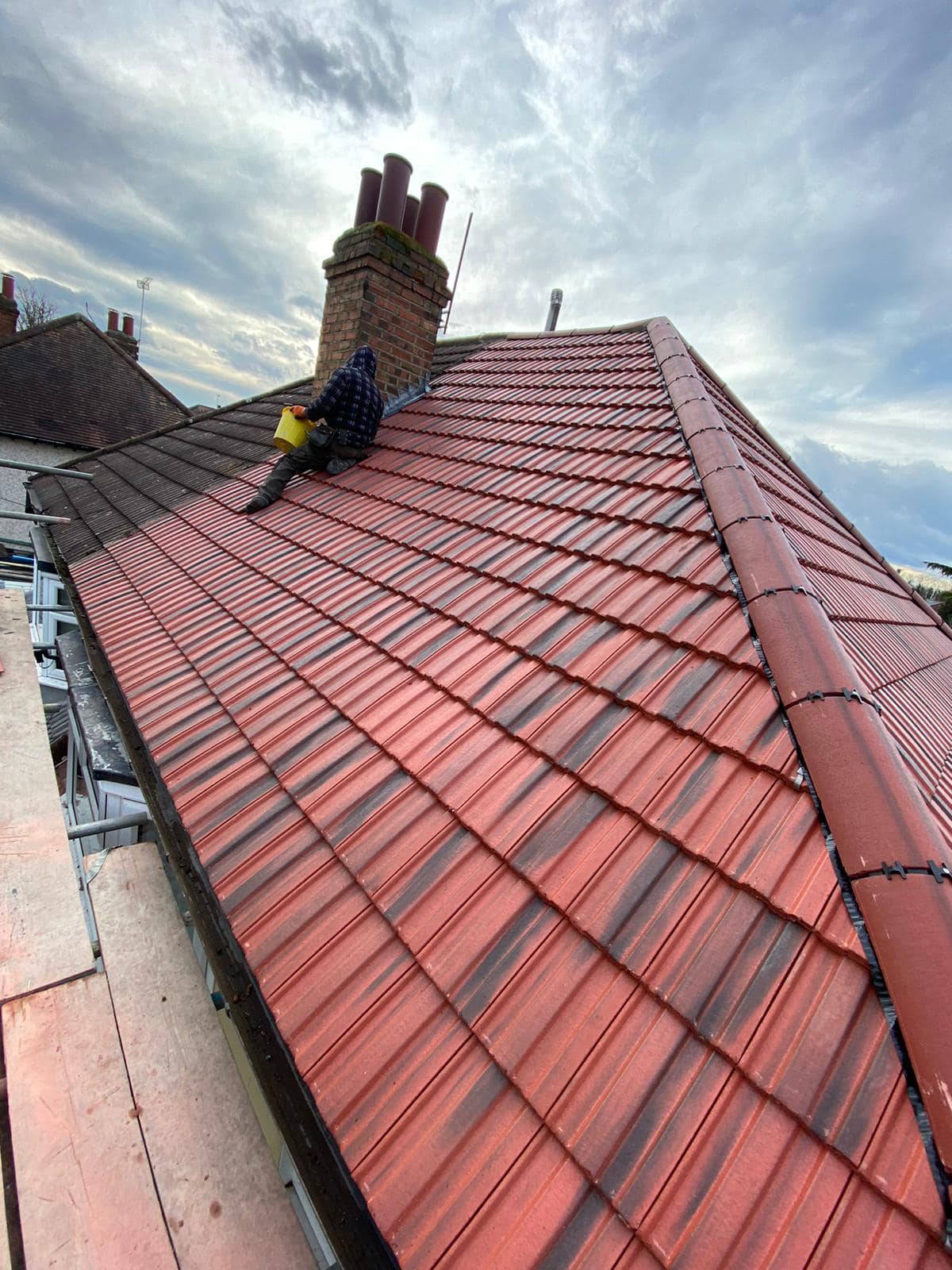 Professional roofers working on a property in London - KS Roof Master