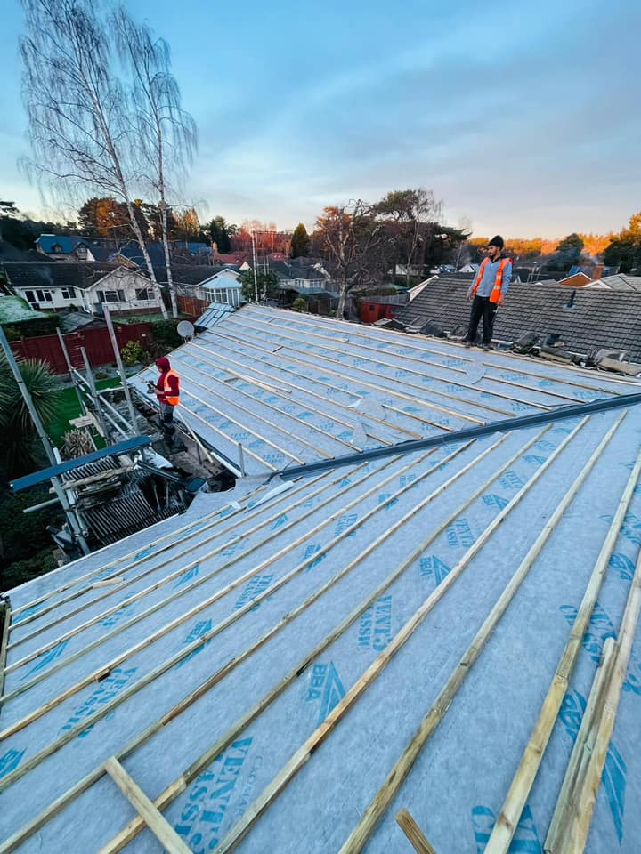 Professional roofers working on a property in London - KS Roof Master