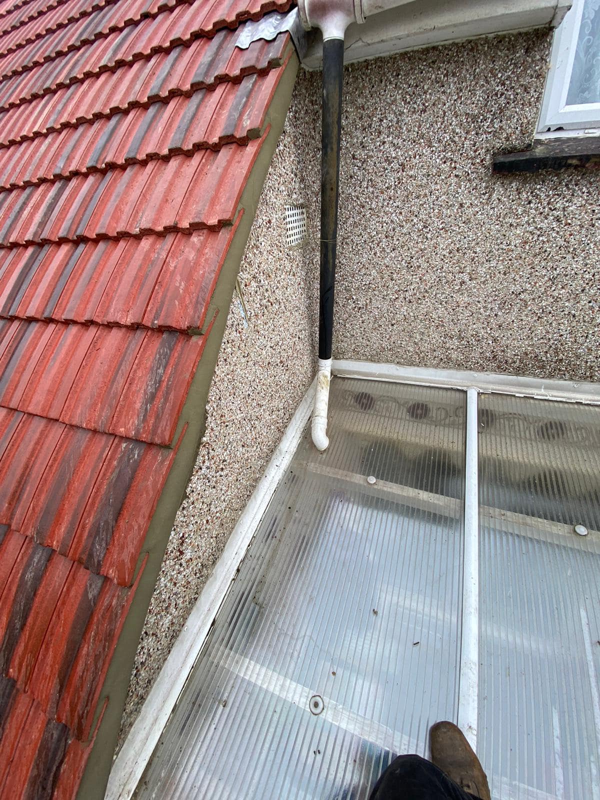 Professional roofers working on a property in London - KS Roof Master