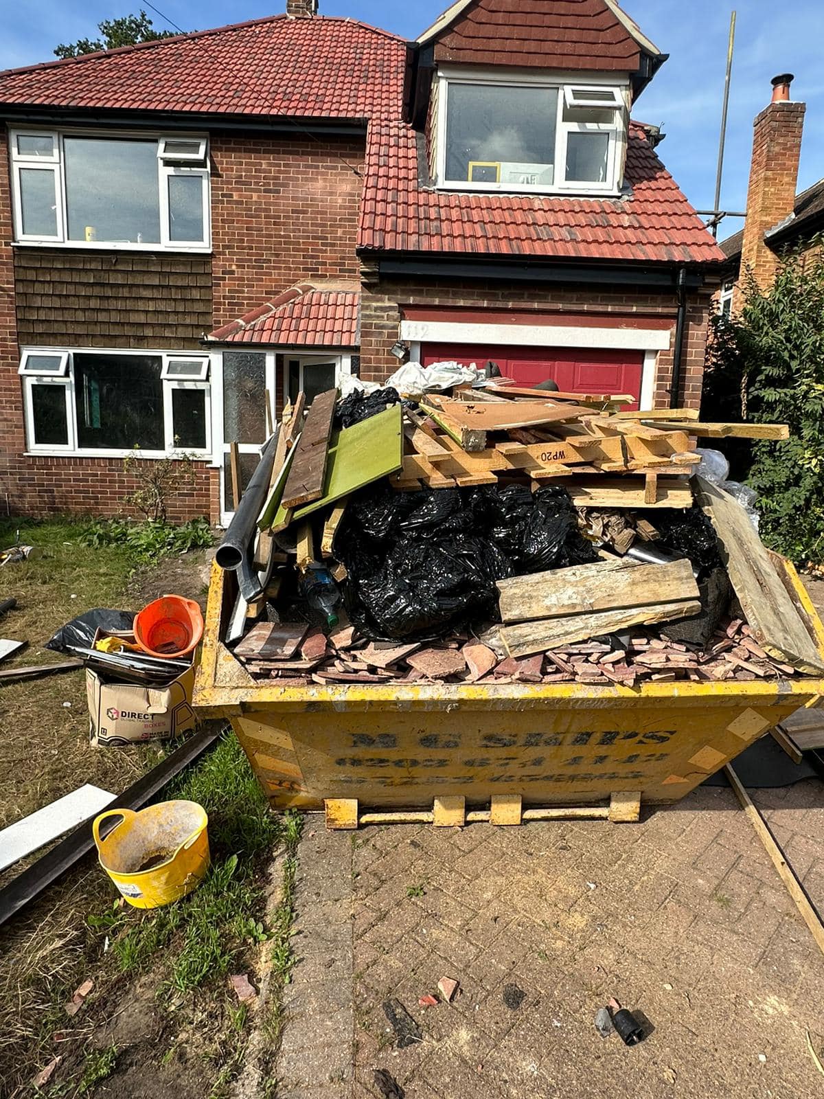 Professional roofers working on a property in London - KS Roof Master