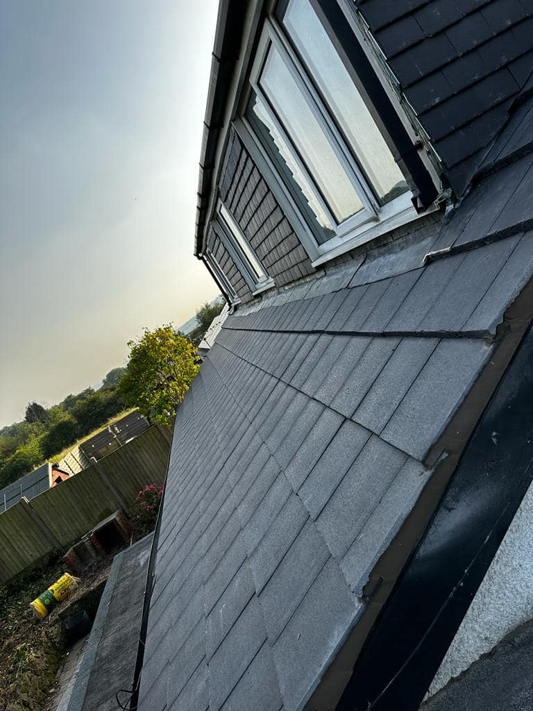 Professional roofers working on a property in London - KS Roof Master