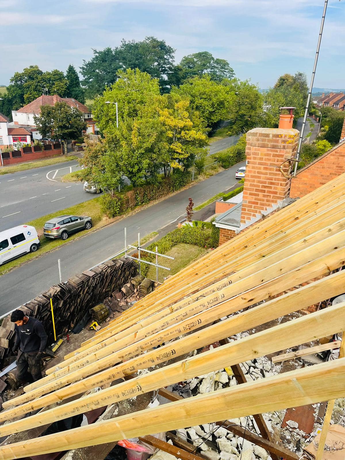 Professional roofers working on a property in London - KS Roof Master