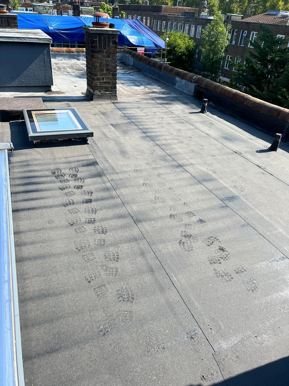 Flat roof coating in Brixton