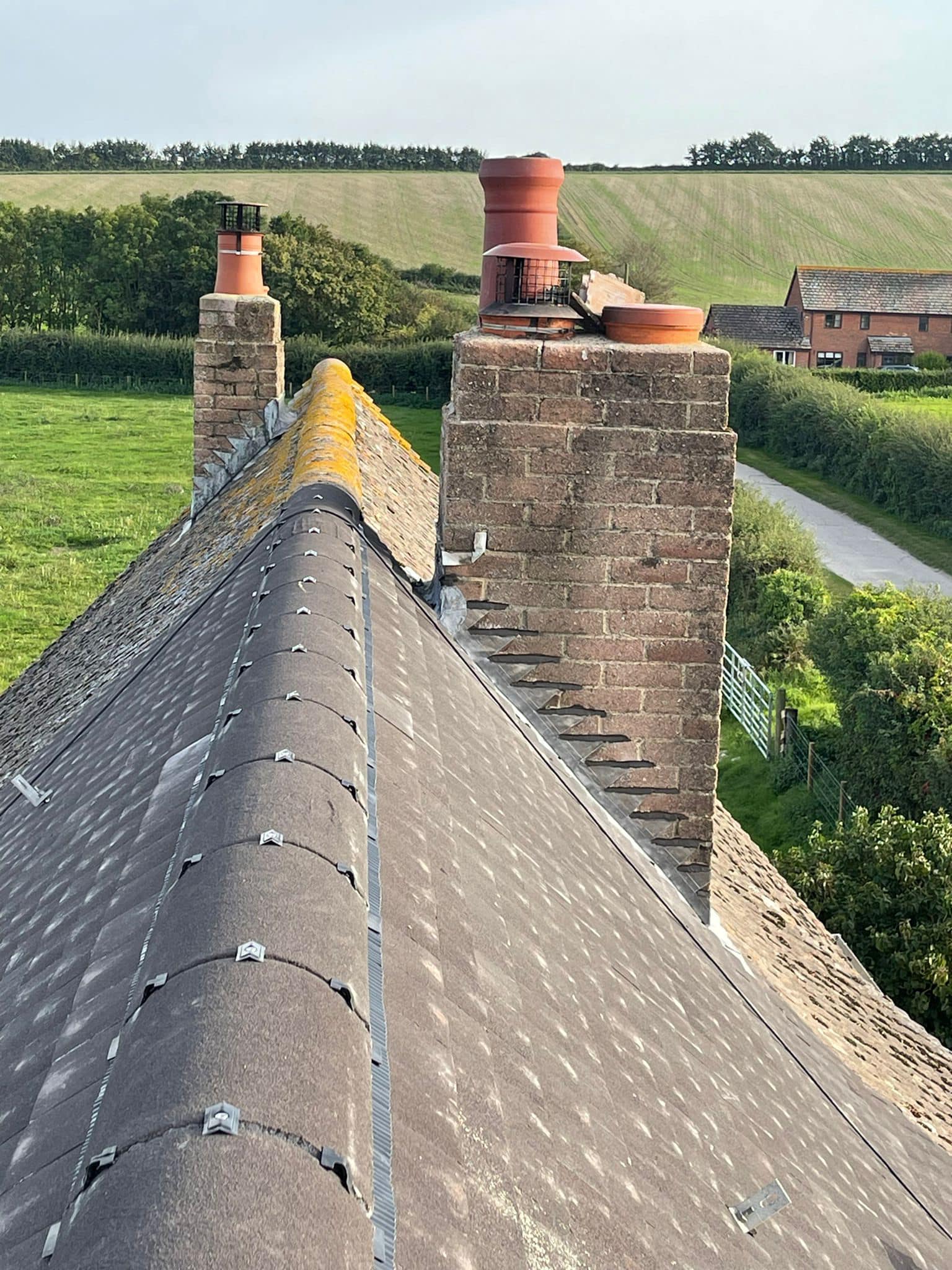 Professional roofers working on a property in London - KS Roof Master