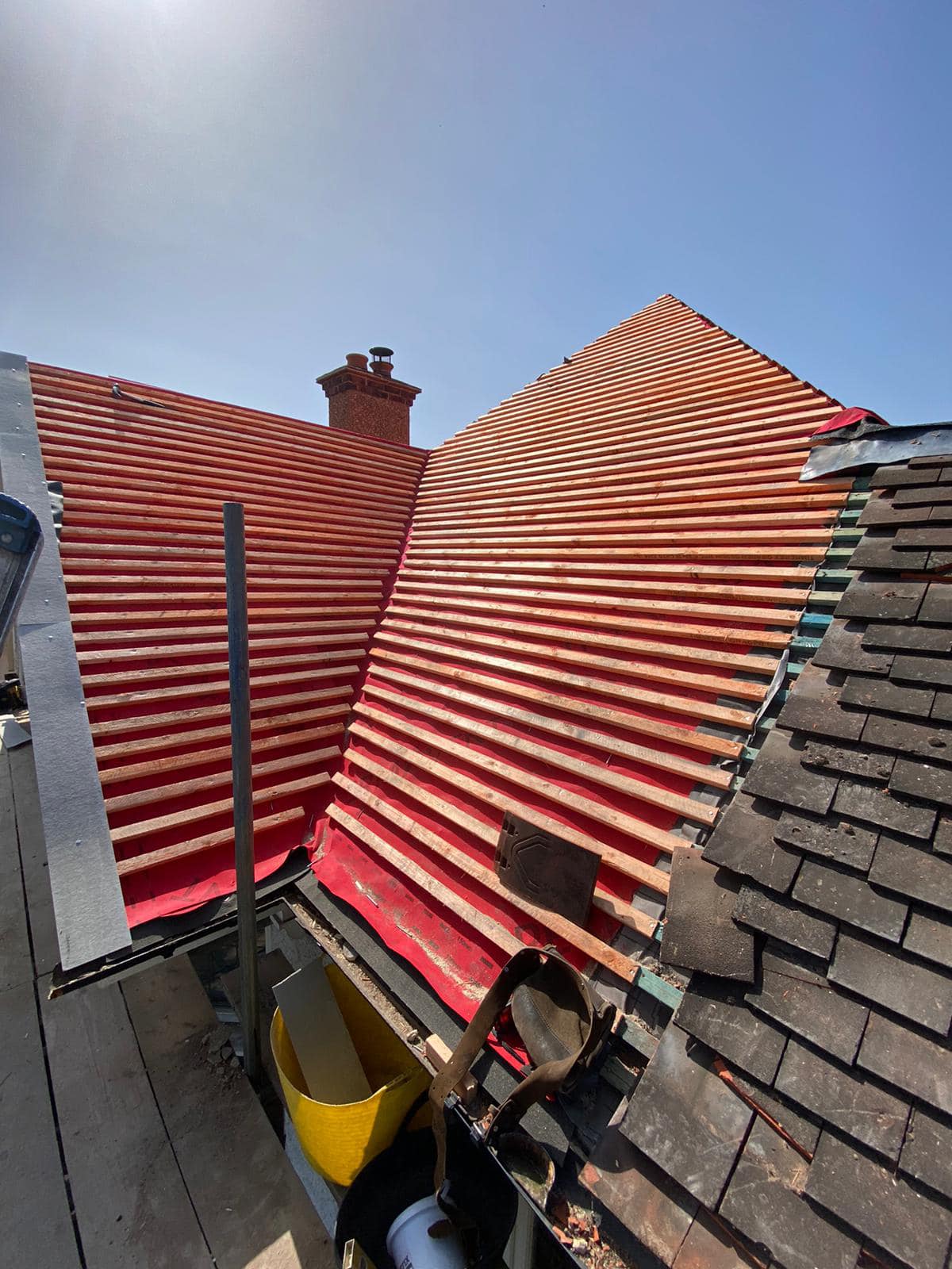 Professional roofers working on a property in London - KS Roof Master