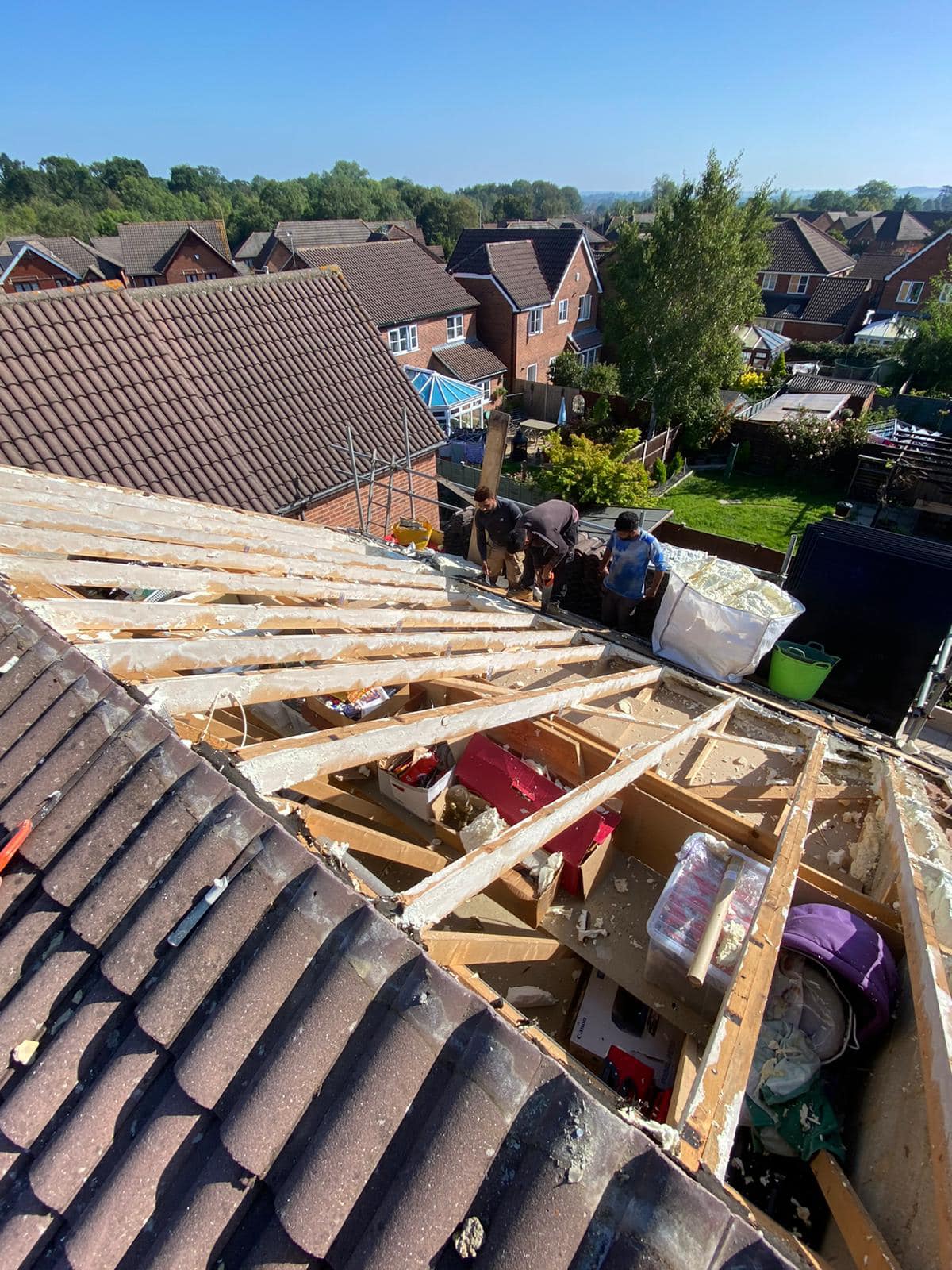 Professional roofers working on a property in London - KS Roof Master