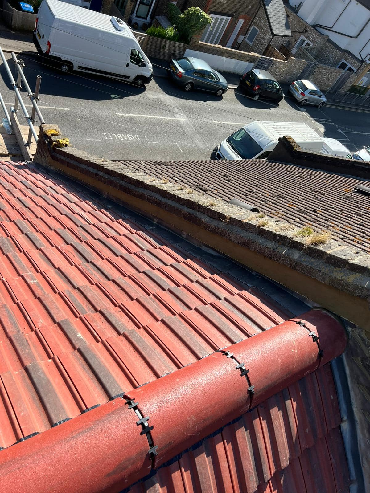 Professional roofers working on a property in London - KS Roof Master