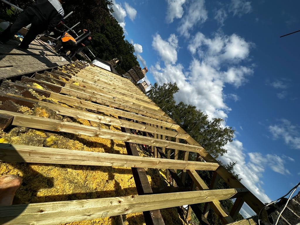 Professional roofers working on a property in London - KS Roof Master