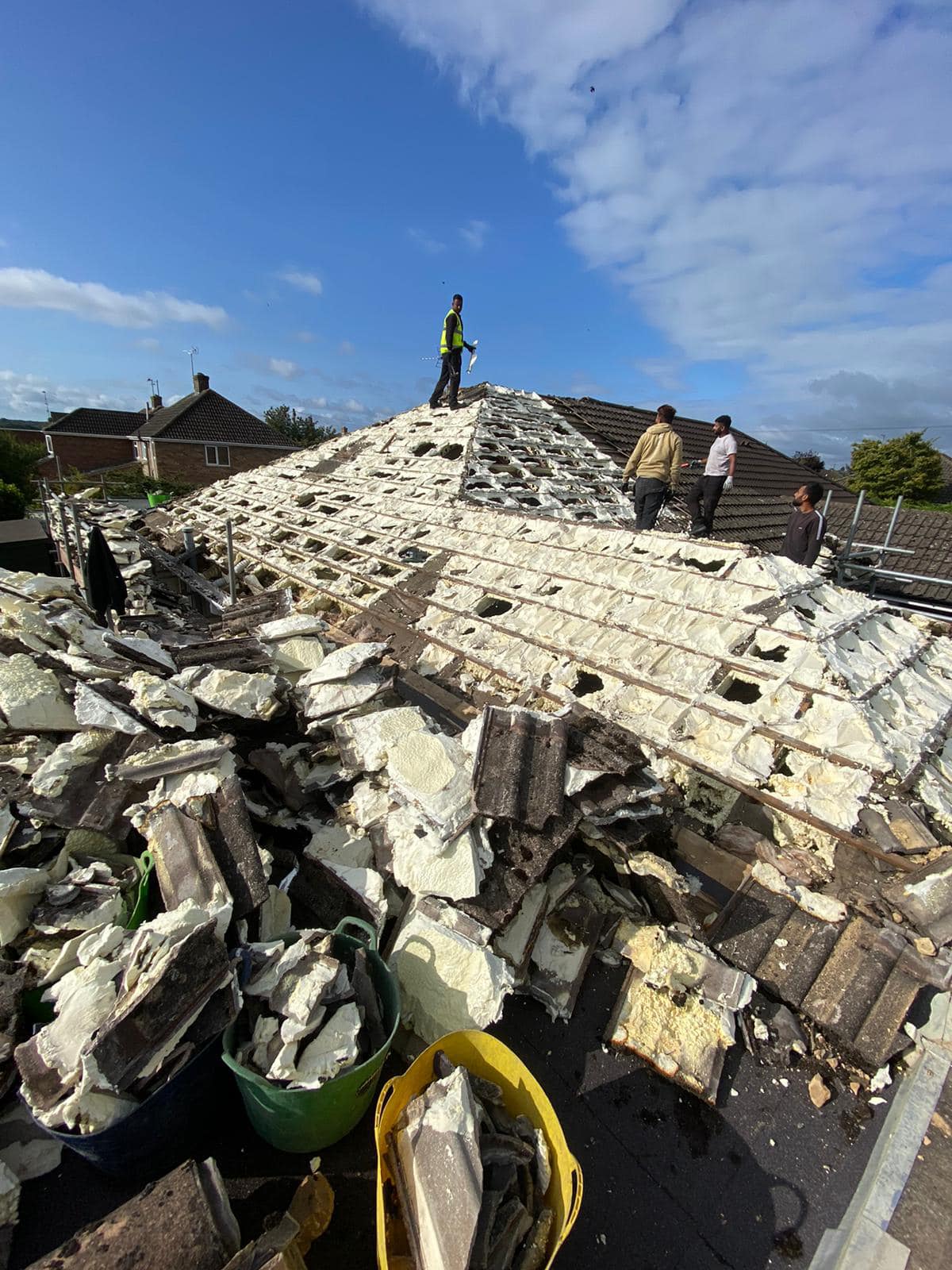 Professional roofers working on a property in London - KS Roof Master