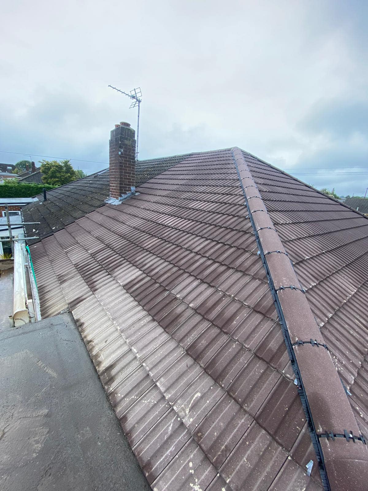 Professional roofers working on a property in London - KS Roof Master