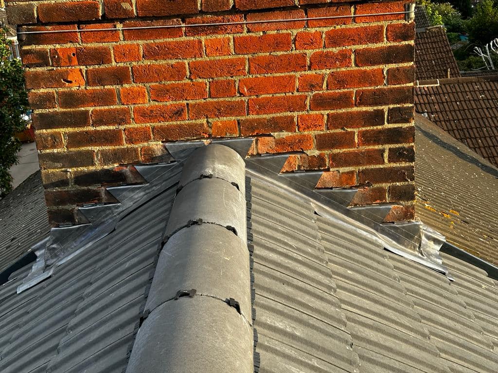 Professional roofers working on a property in London - KS Roof Master