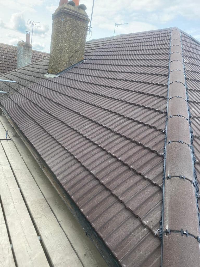 Professional roofers working on a property in London - KS Roof Master