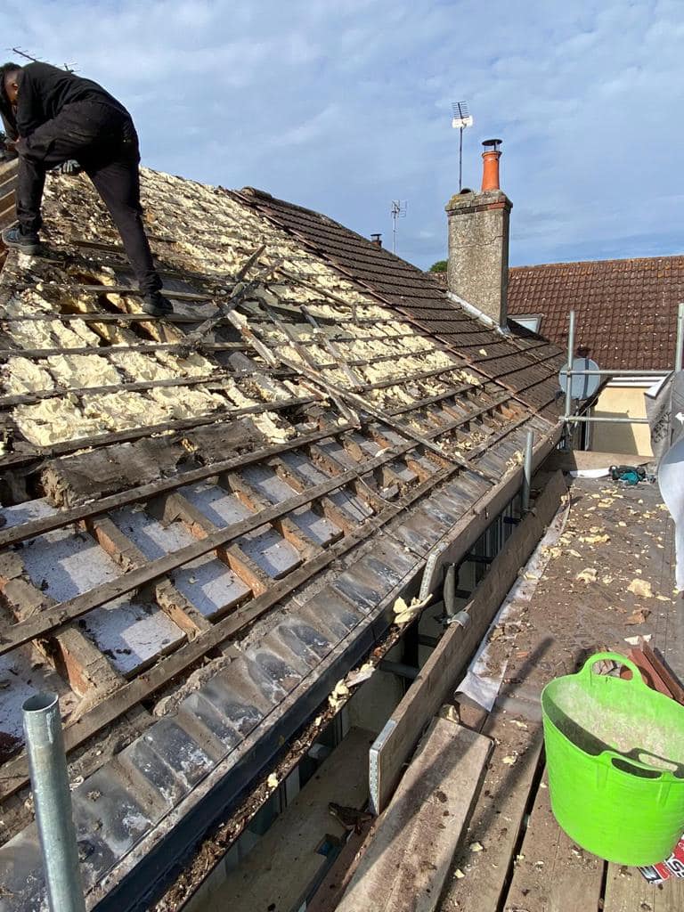 Professional roofers working on a property in London - KS Roof Master