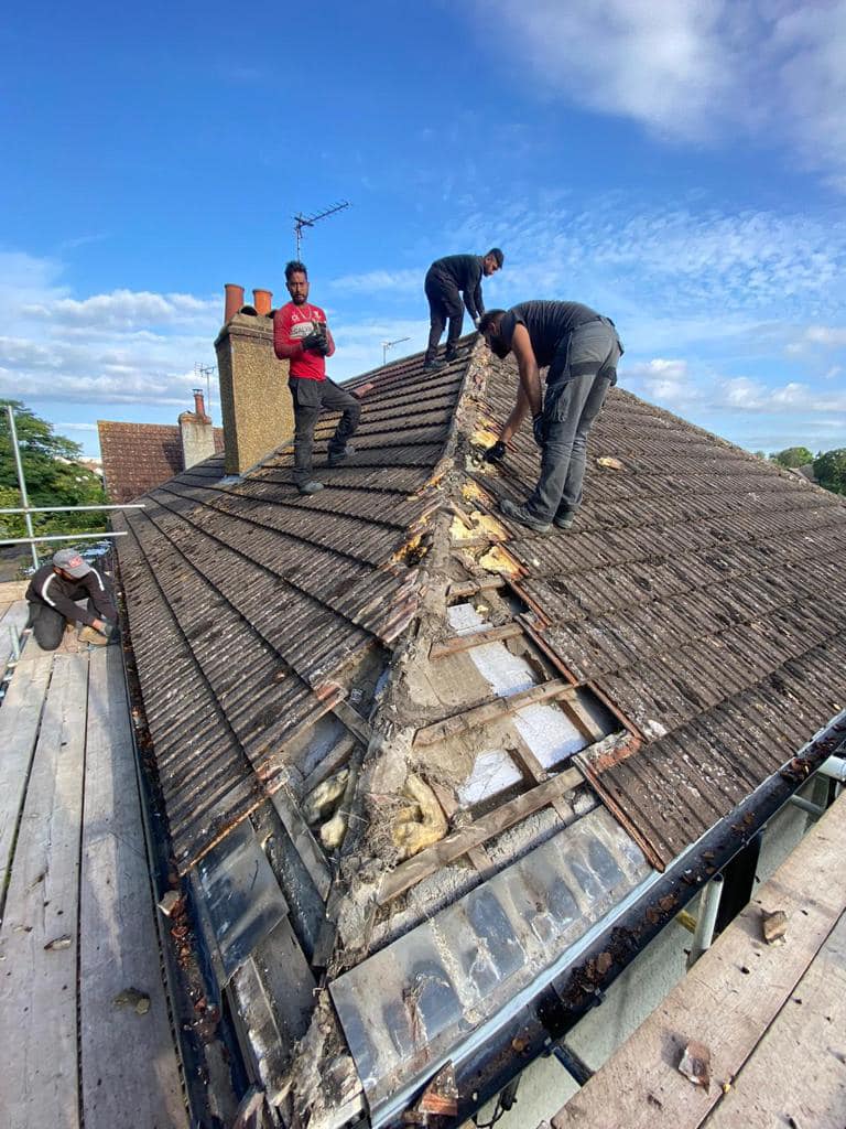 Professional roofers working on a property in London - KS Roof Master