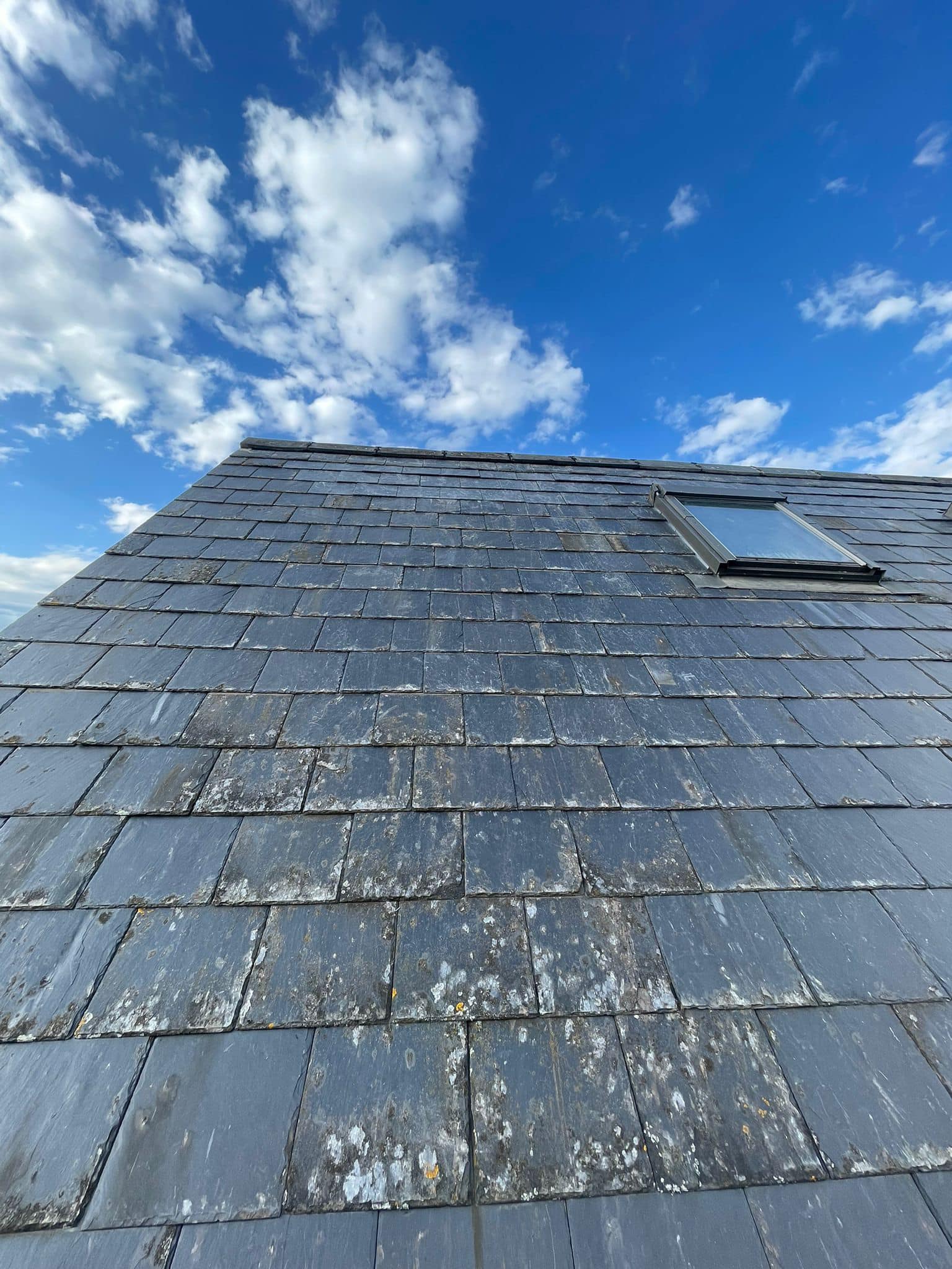 Professional roofers working on a property in London - KS Roof Master