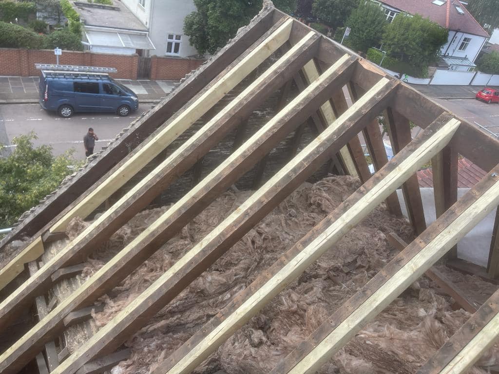 Professional roofers working on a property in London - KS Roof Master