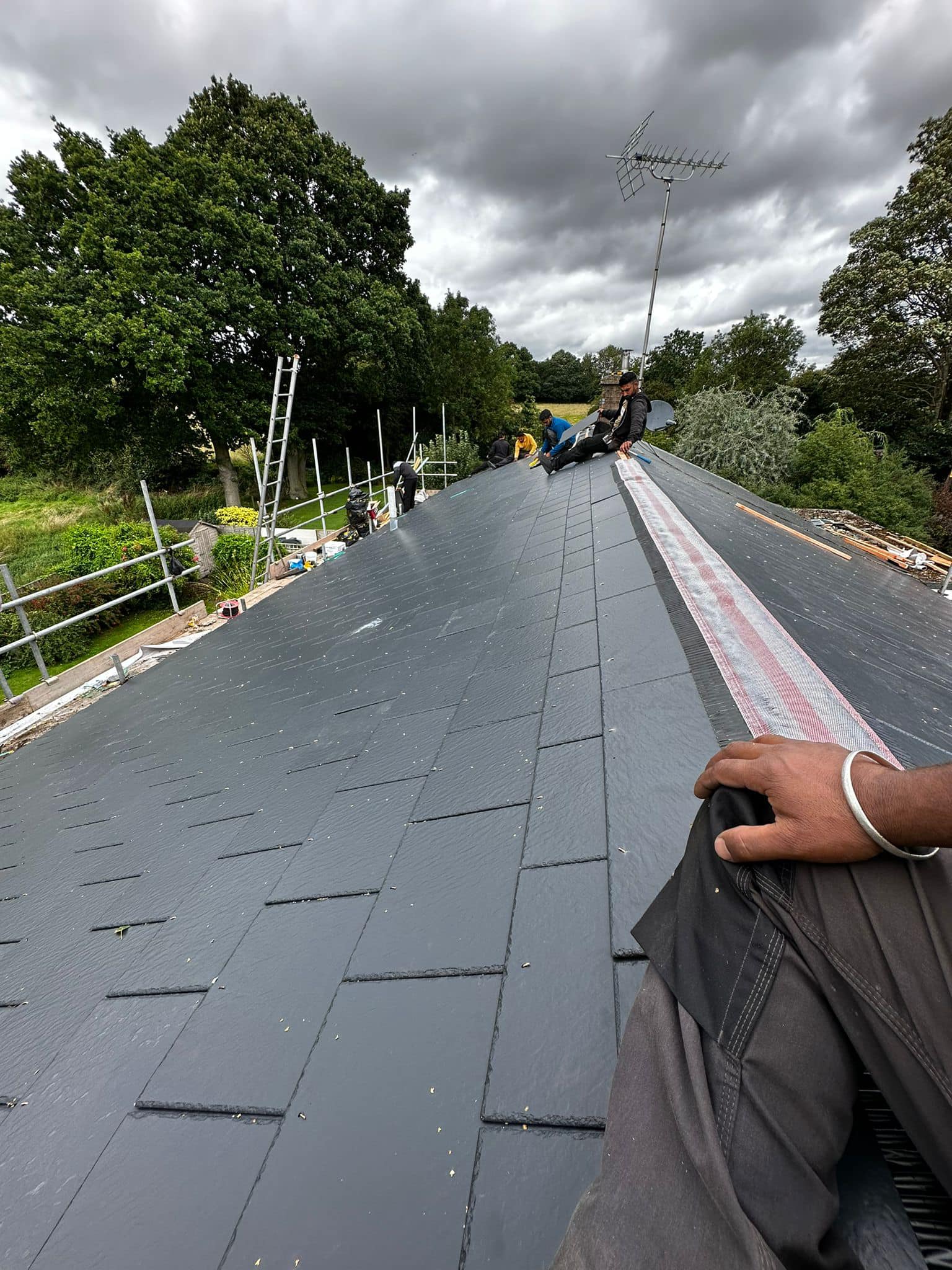 Professional roofers working on a property in London - KS Roof Master