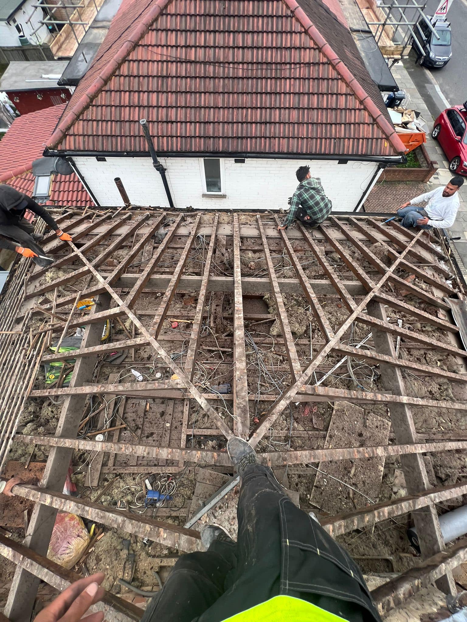 Professional roofers working on a property in London - KS Roof Master