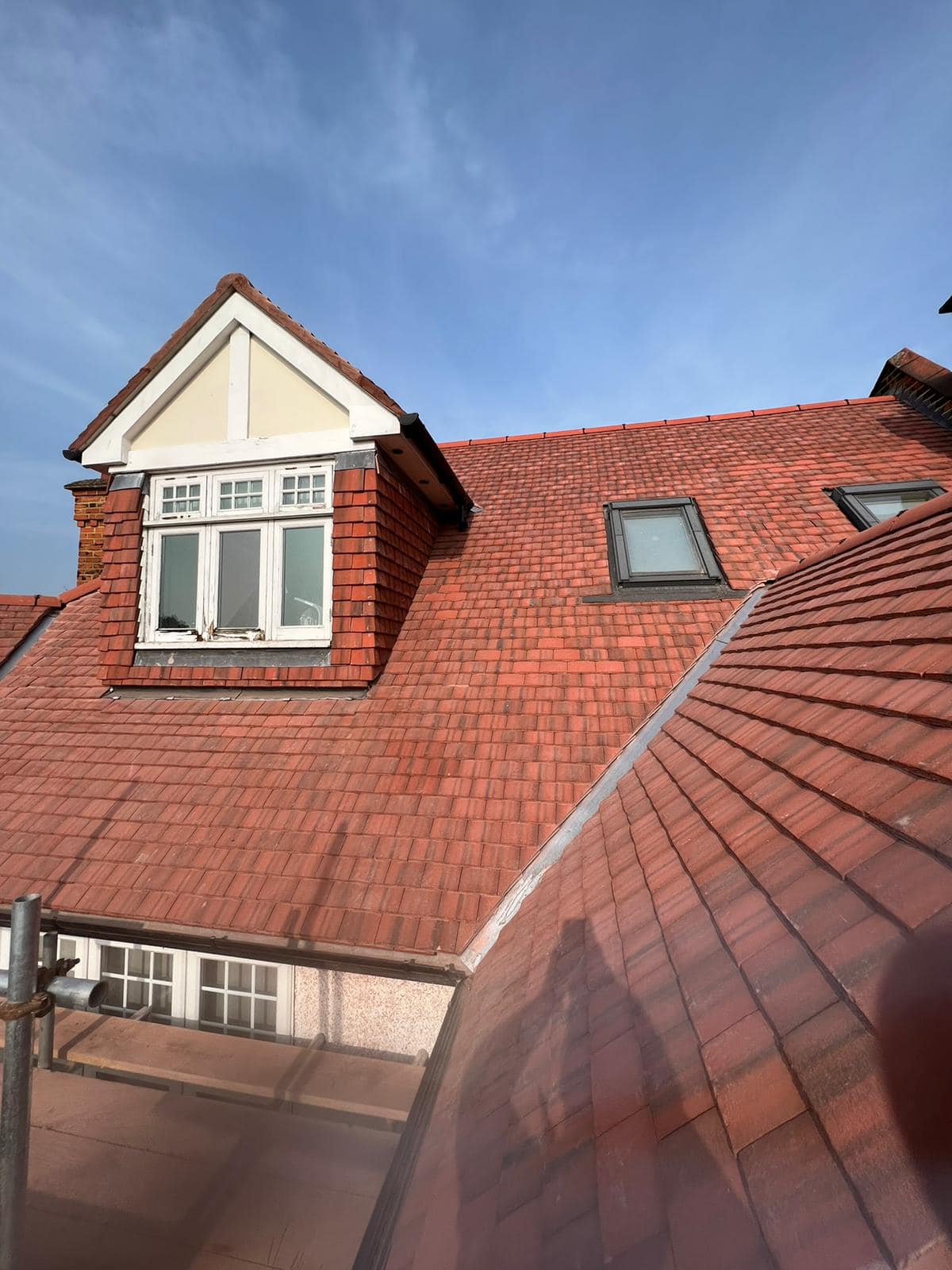 Professional roofers working on a property in London - KS Roof Master