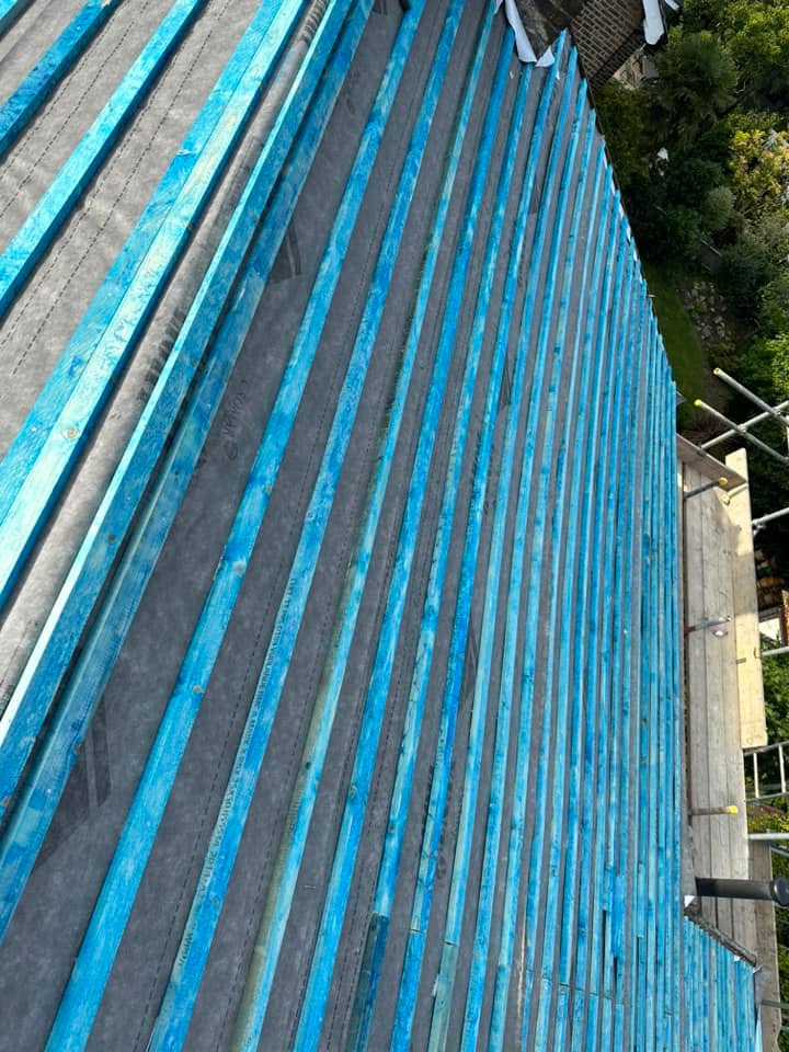Professional roofers working on a property in London - KS Roof Master