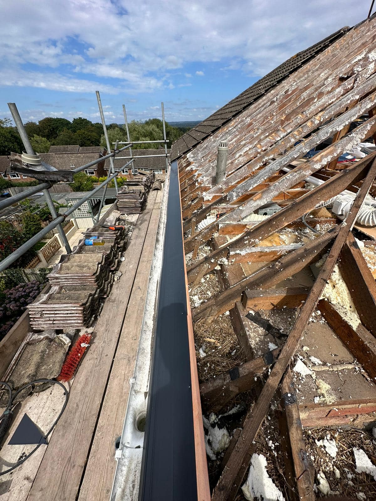 Professional roofers working on a property in London - KS Roof Master