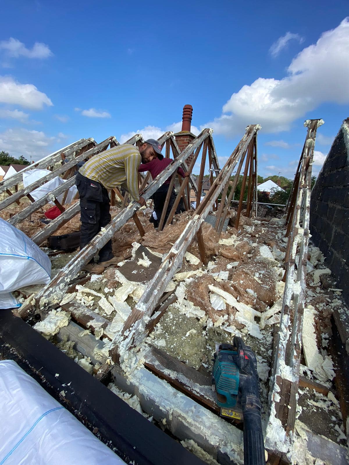 Professional roofers working on a property in London - KS Roof Master