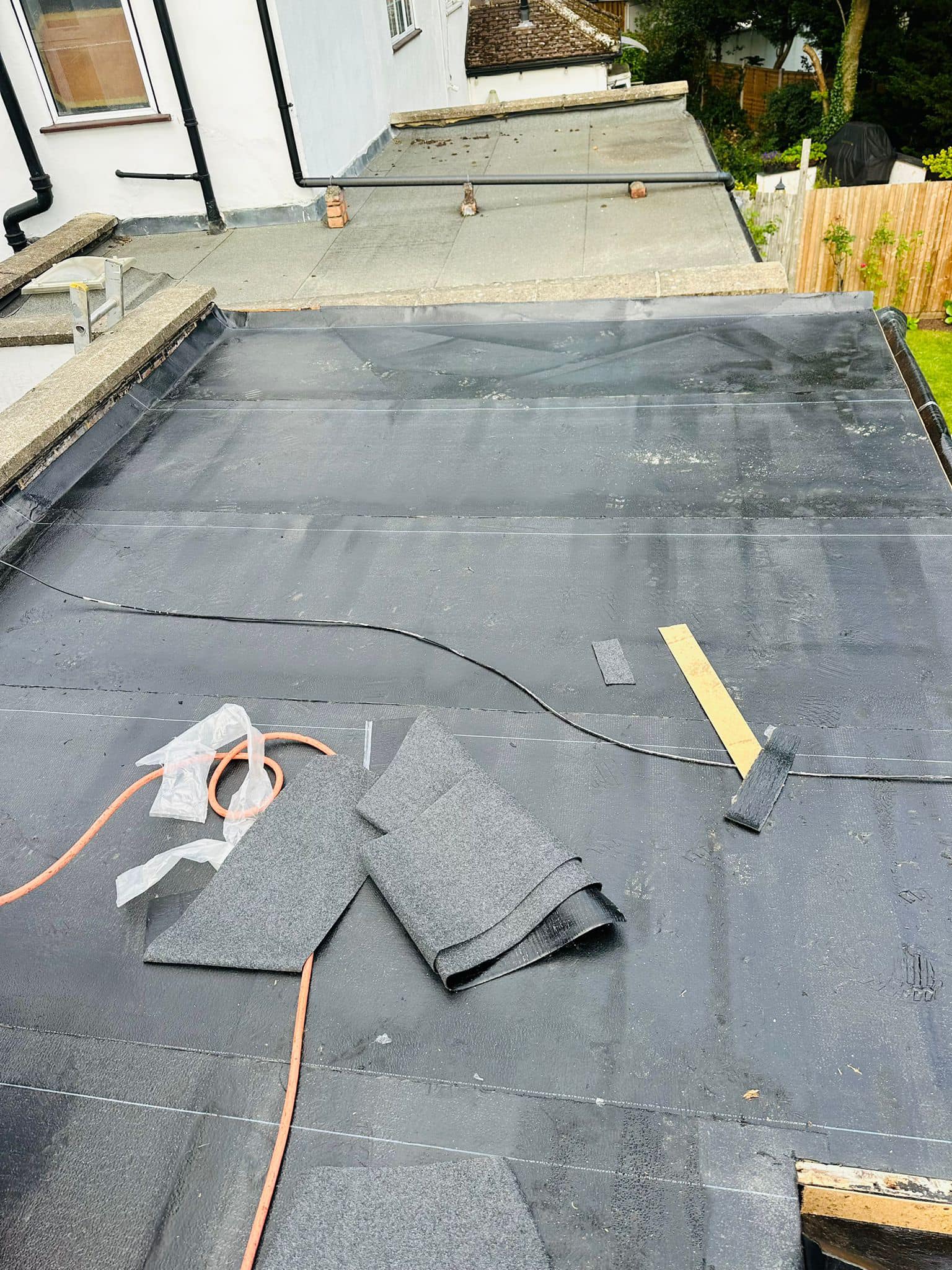 Professional roofers working on a property in London - KS Roof Master