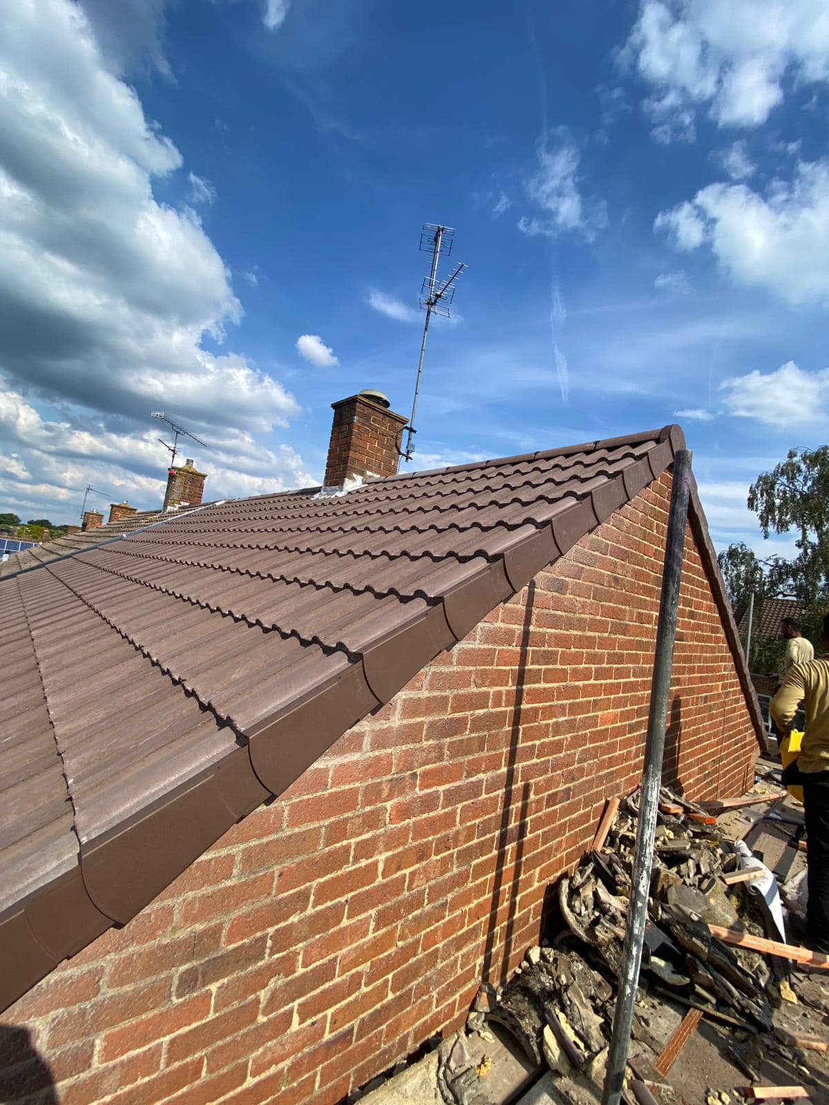 Professional roofers working on a property in London - KS Roof Master