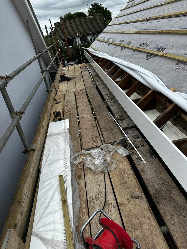 Professional roofers working on a property in London - KS Roof Master