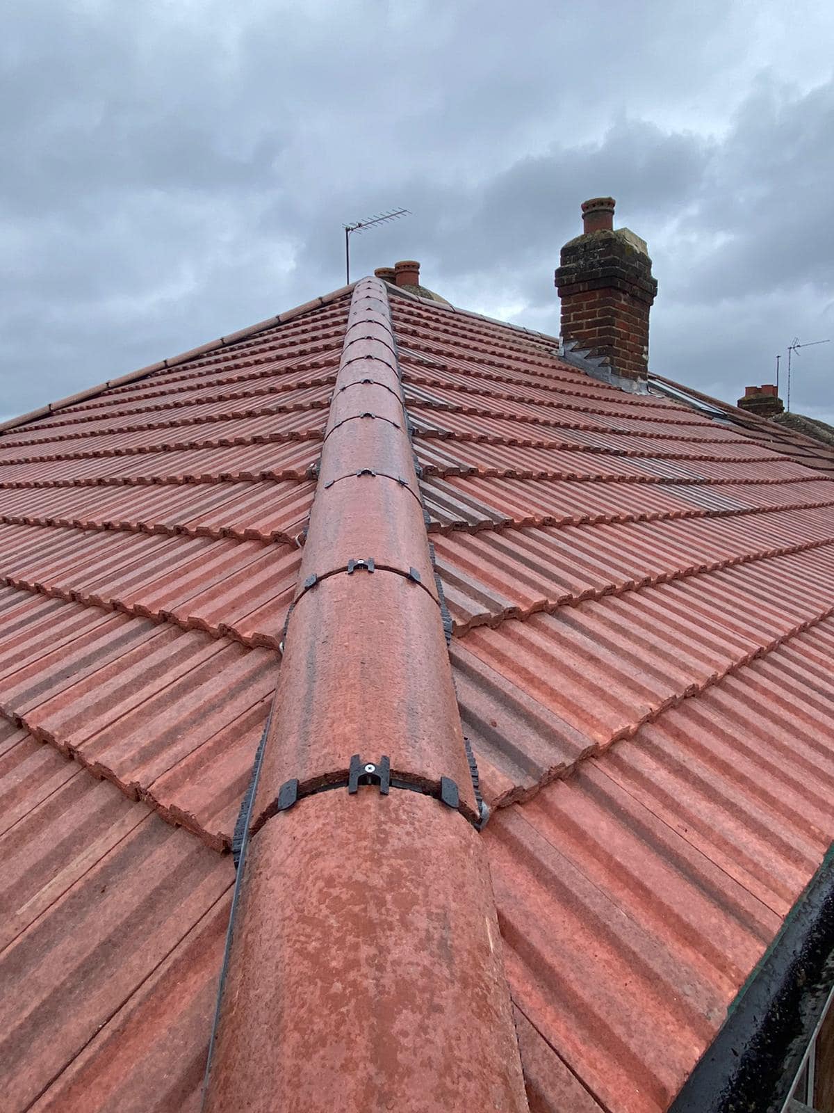 Professional roofers working on a property in London - KS Roof Master