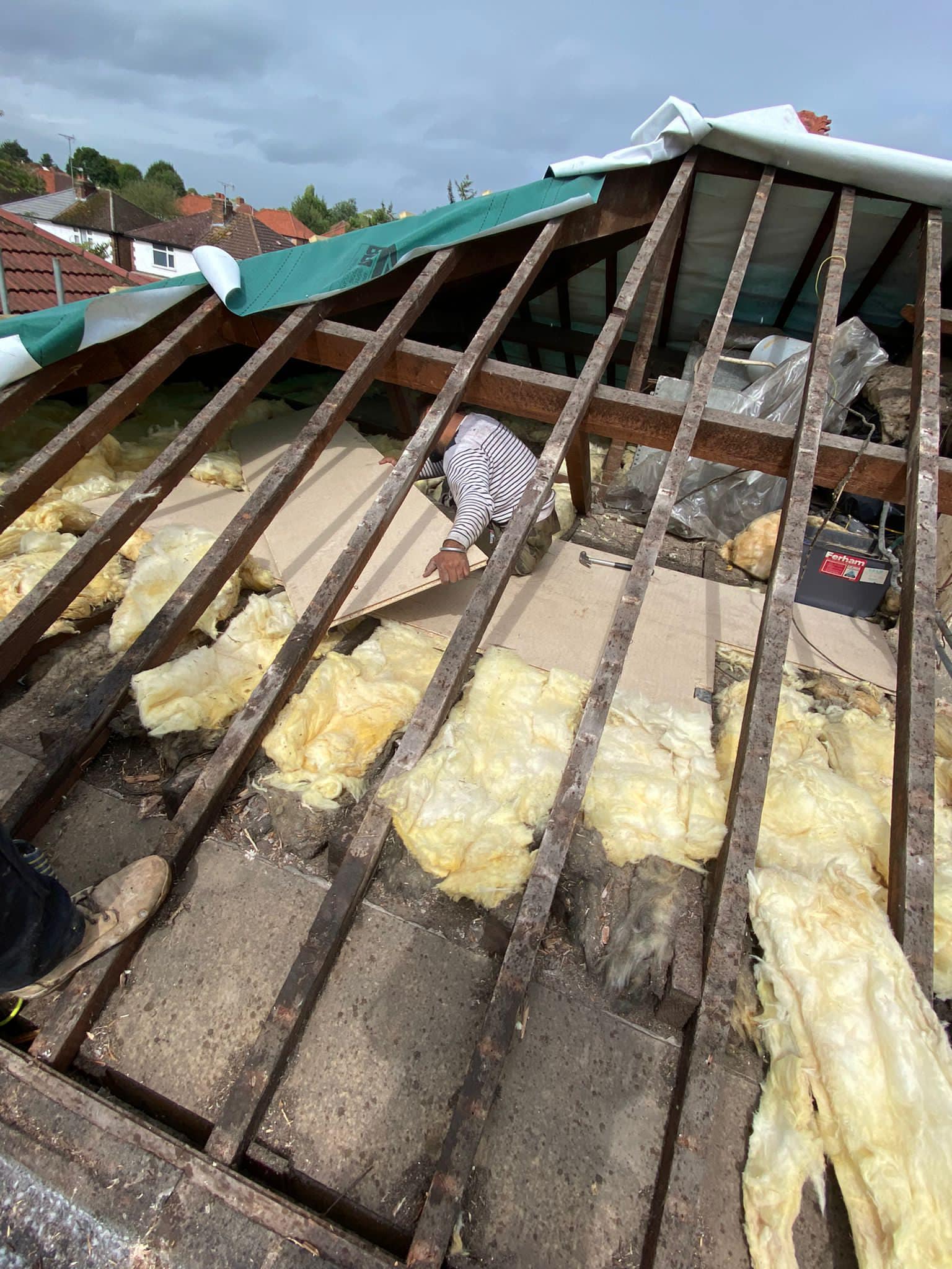 Professional roofers working on a property in London - KS Roof Master
