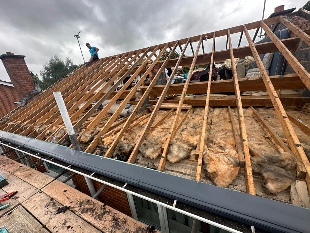 Professional roofers working on a property in London - KS Roof Master