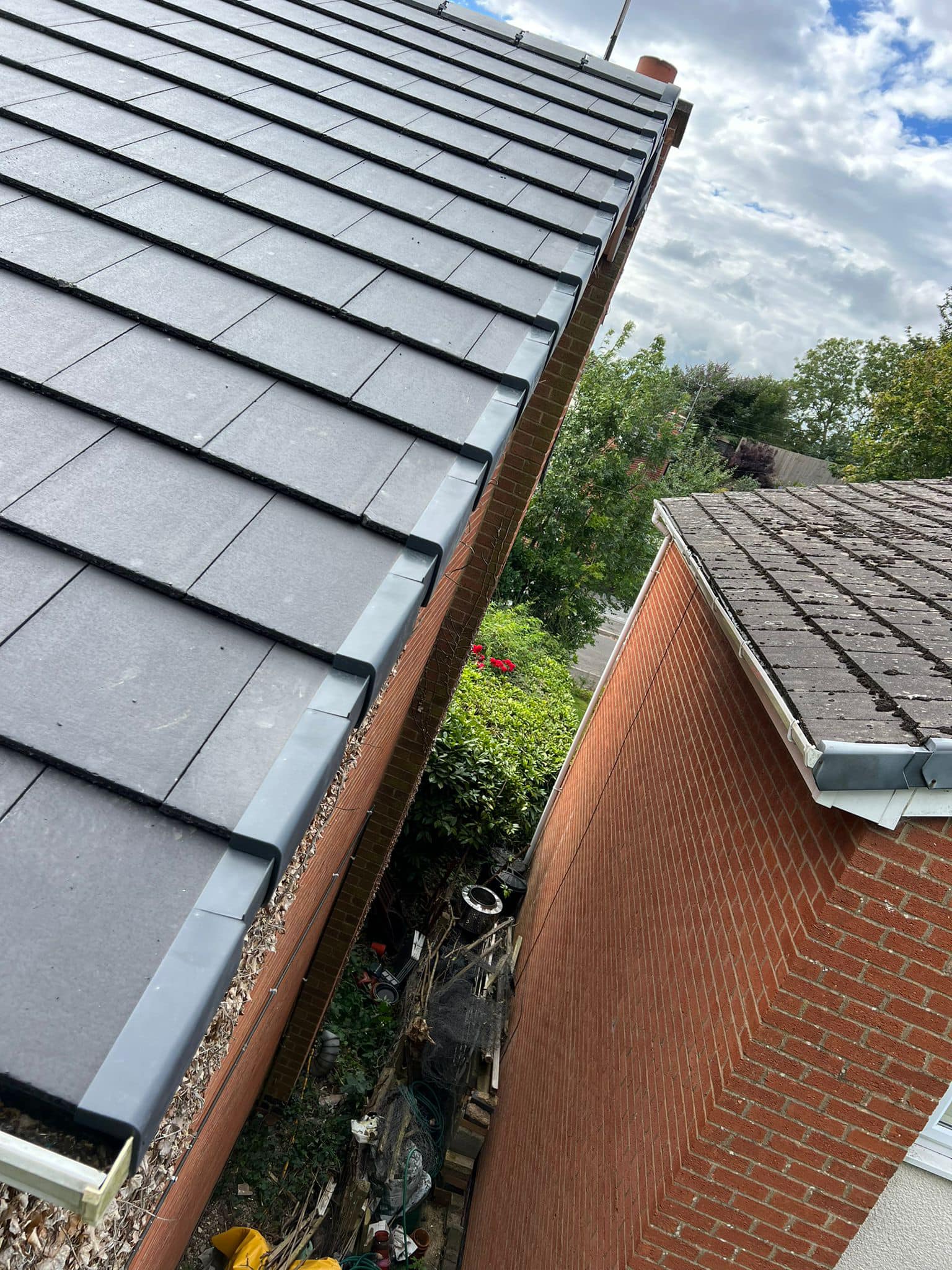 Professional roofers working on a property in London - KS Roof Master