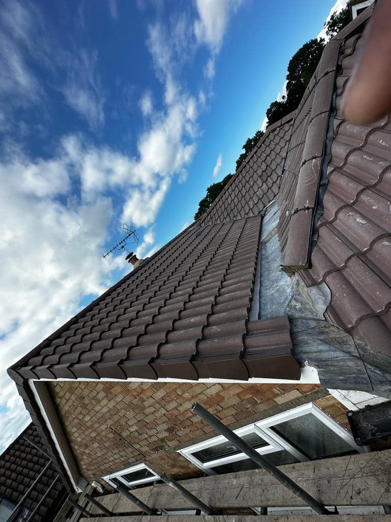 Professional roofers working on a property in London - KS Roof Master