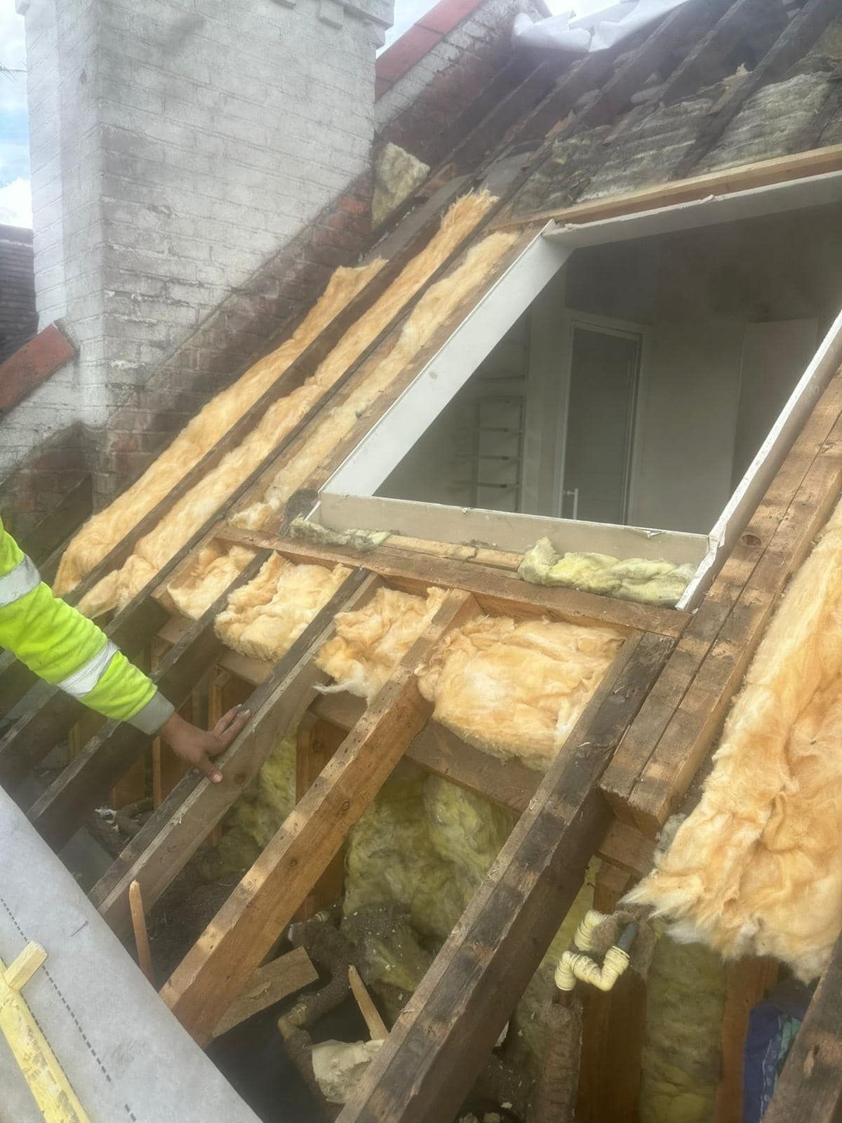 Professional roofers working on a property in London - KS Roof Master