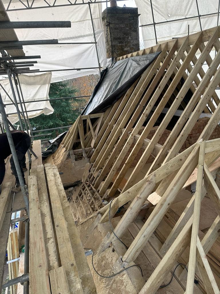 Professional roofers working on a property in London - KS Roof Master