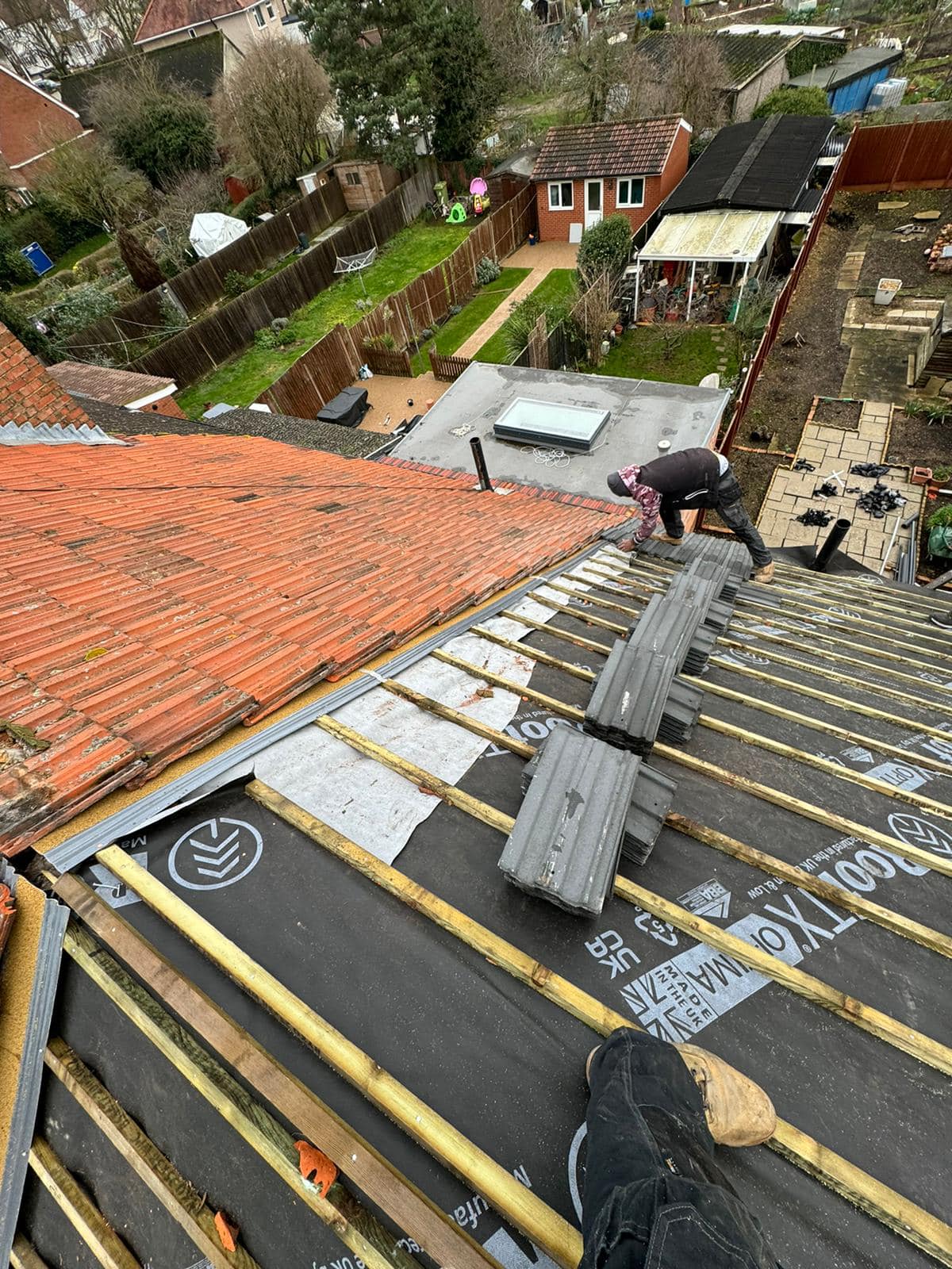 Professional roofers working on a property in London - KS Roof Master