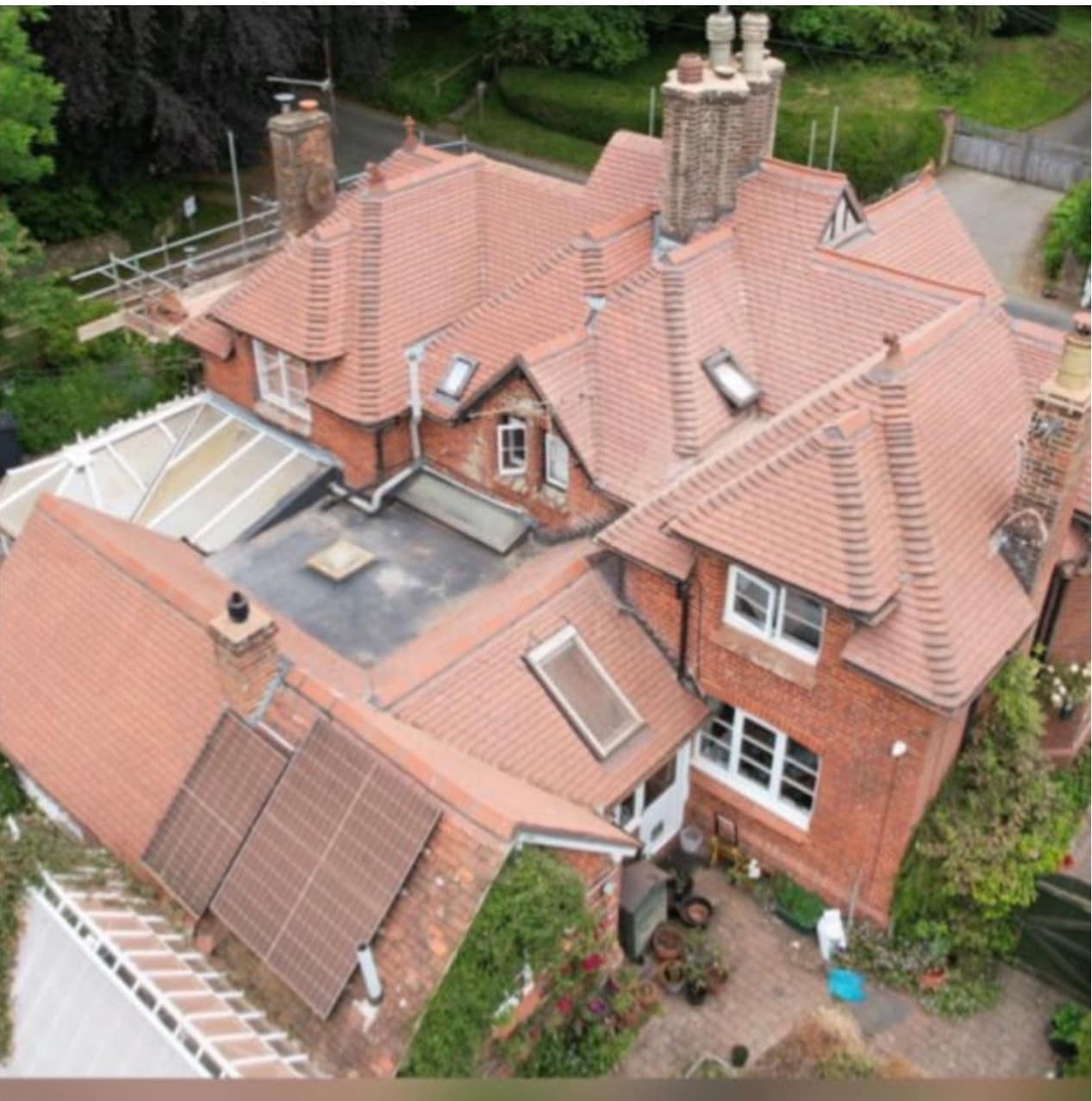 Professional roofers working on a property in London - KS Roof Master