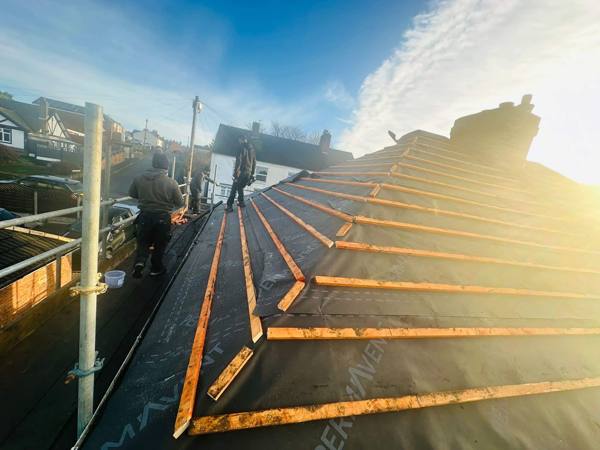 Professional roofers working on a property in London - KS Roof Master