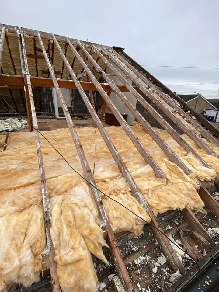 Professional roofers working on a property in London - KS Roof Master