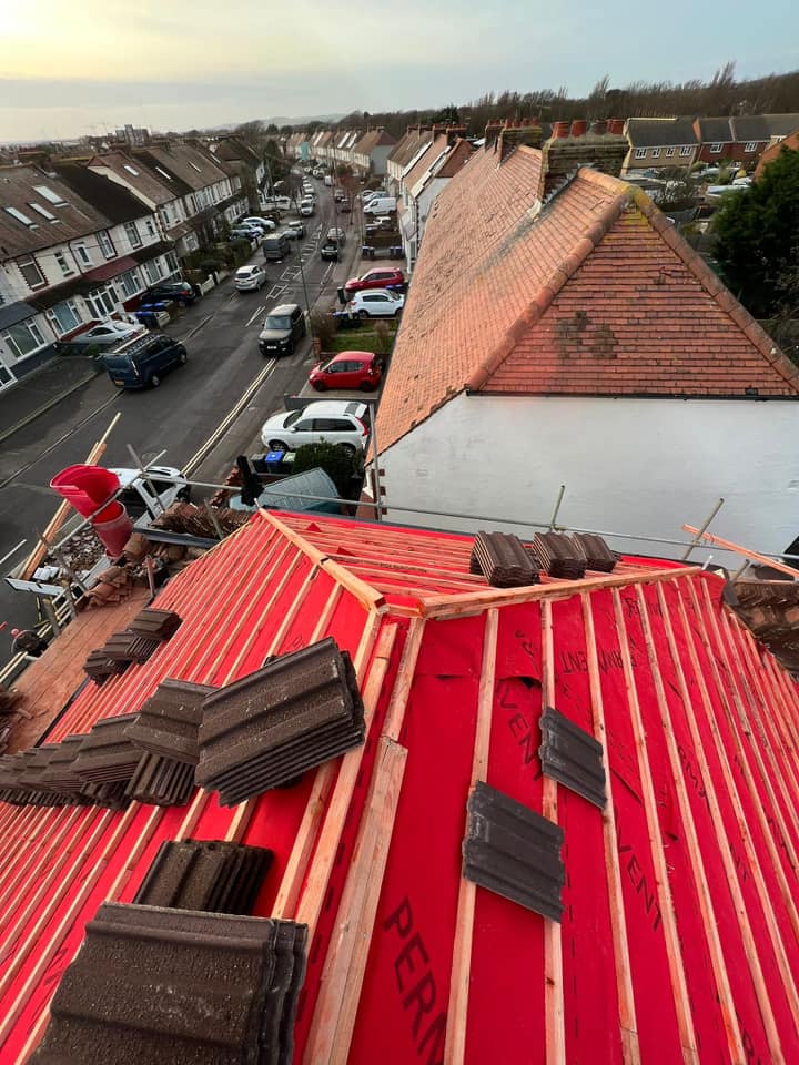 Professional roofers working on a property in London - KS Roof Master