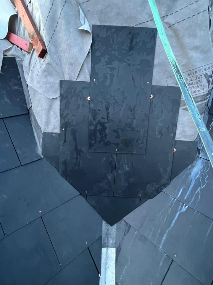 Professional roofers working on a property in London - KS Roof Master