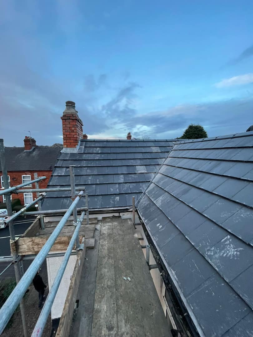 Professional roofers working on a property in London - KS Roof Master