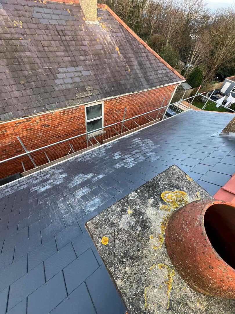 Professional roofers working on a property in London - KS Roof Master