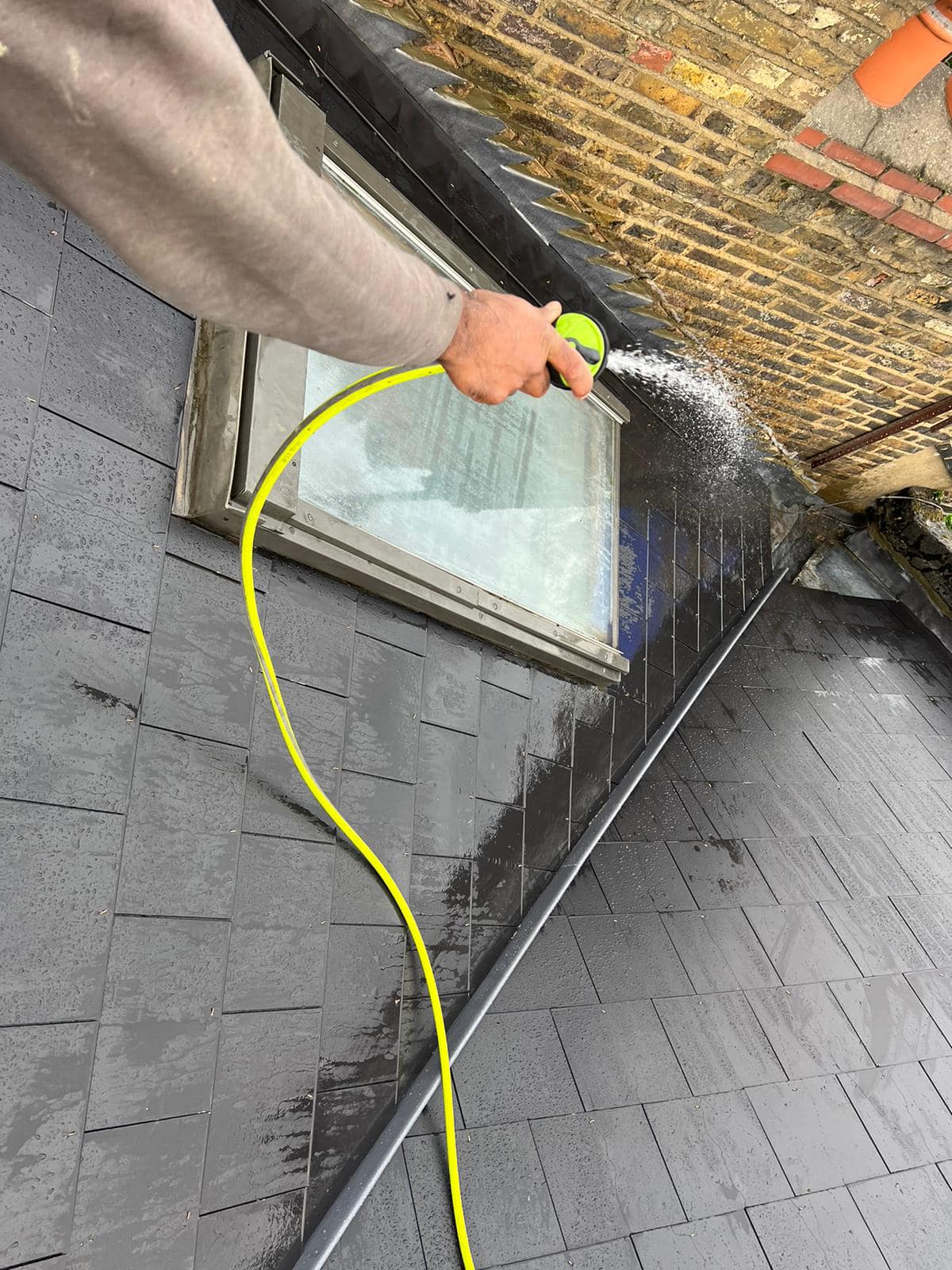 Professional roofers working on a property in London - KS Roof Master