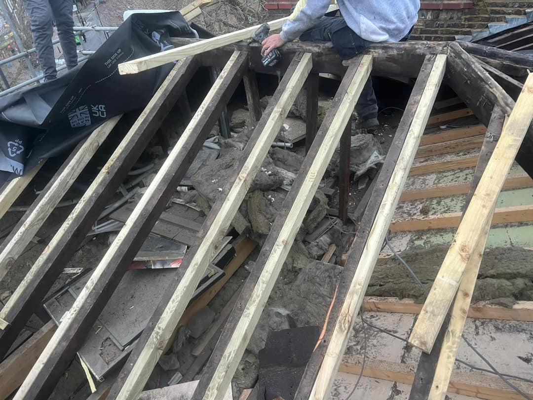 Professional roofers working on a property in London - KS Roof Master